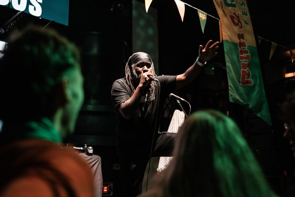 JackKimberPhotographyLtd_@jackkimberphoto-82 Performer on stage at R&R Fest