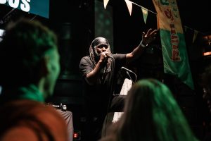 Performer on stage at R&R Fest